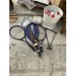 AN ASSORTMENT OF SPORTS ITEMS TO INCLUDE TENNIS RACKETS AND FOOTBALLS ETC