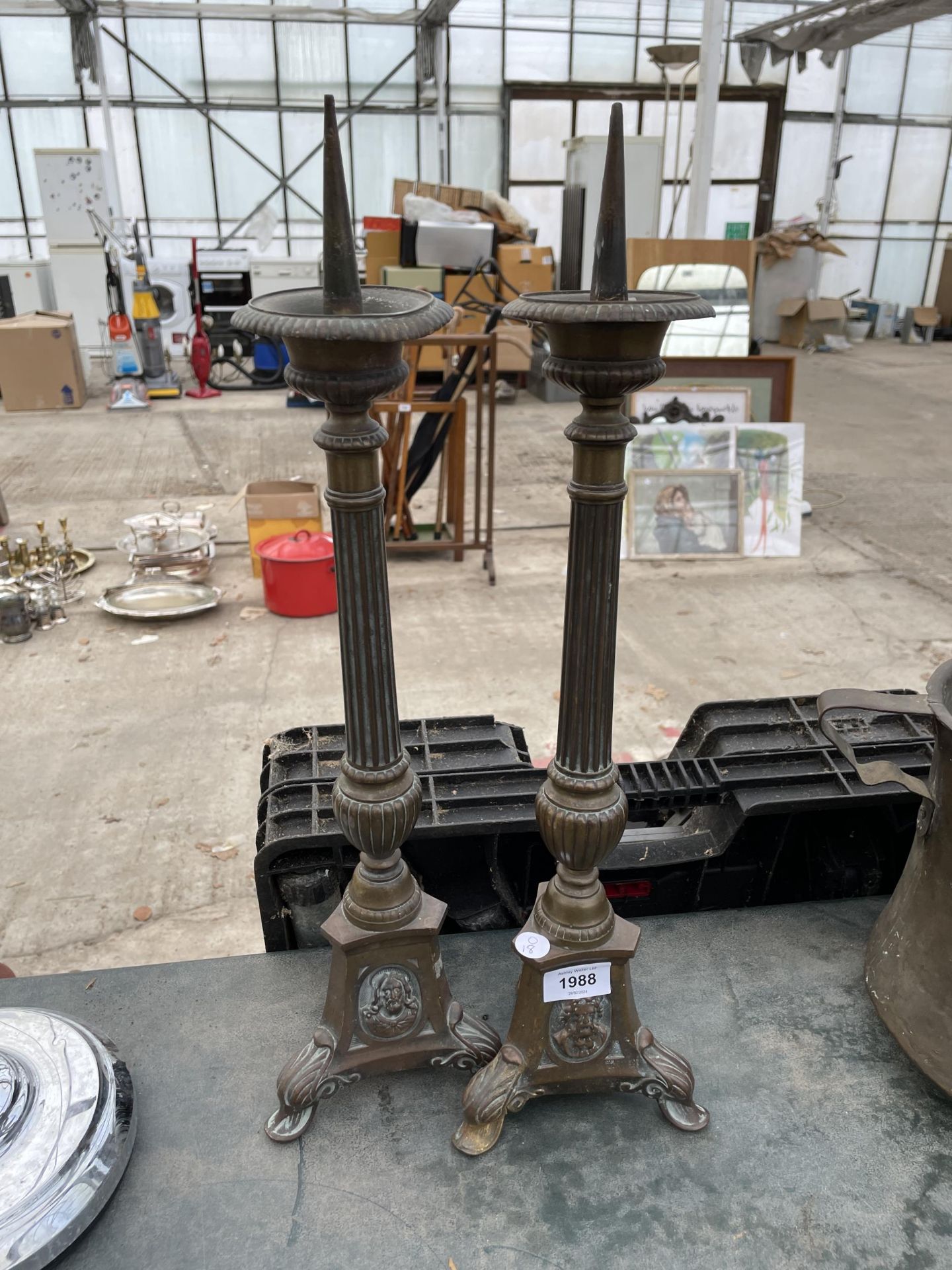 TWO VINTAGE AND DECORATIVE BRASS CANDLE STICKS