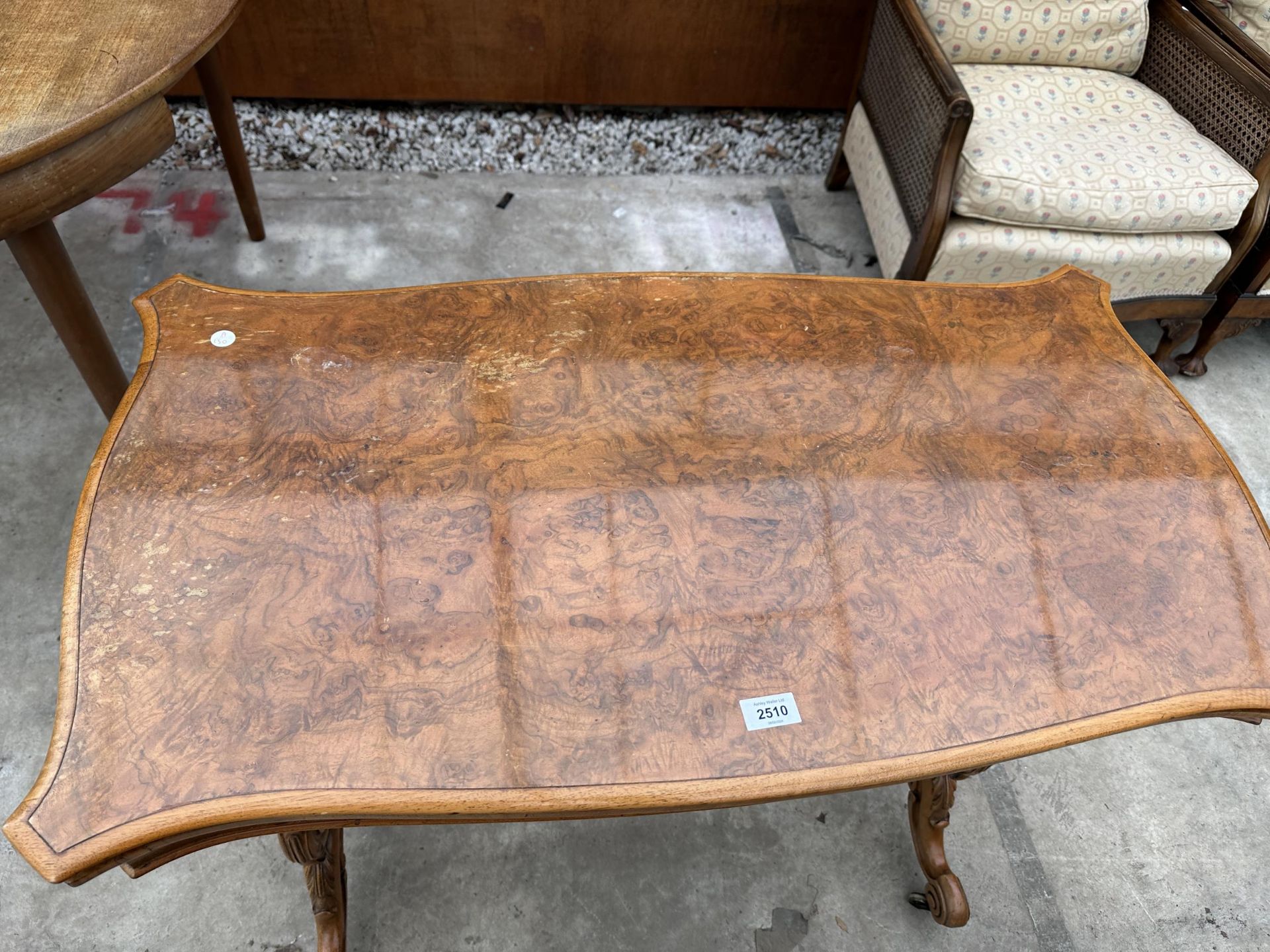 A VICTORIAN WALNUT FOLD OVER GAMES TABLE WITH LYRE SUPPORTS AND TURNED STRETCHER ON BRASS CASTERS - Image 2 of 6