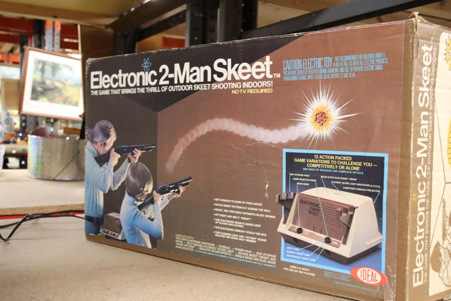 A VINTAGE TWO PERSON ELECTRONIC SKEET SHOOTING GAME, BOXED - UNSURE IF WORKING