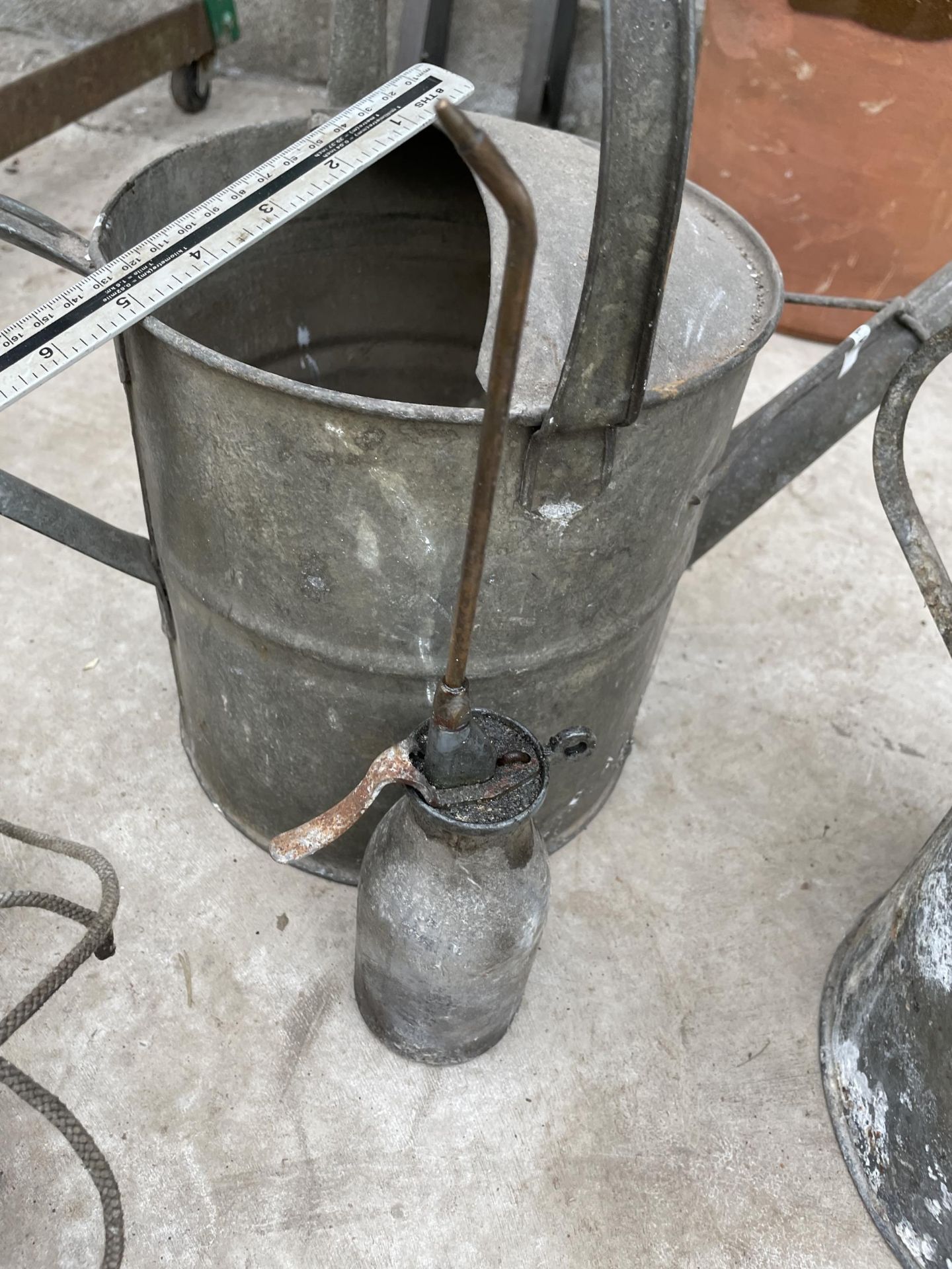 TWO GALVANISED WATERING CANS AND AN OIL CAN - Image 2 of 2