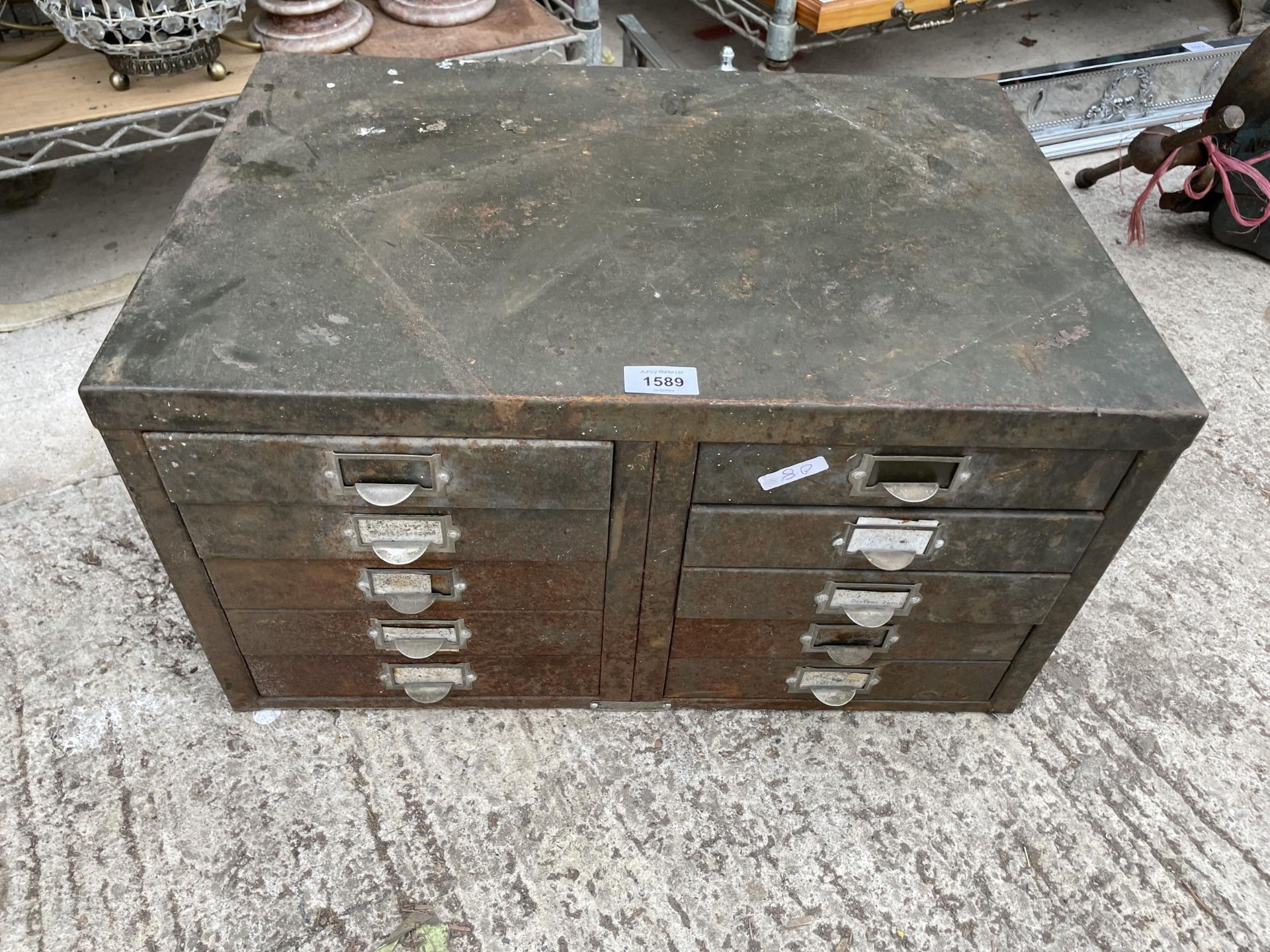 A VINTAGE TEN DRAWER METAL TOOL CHEST