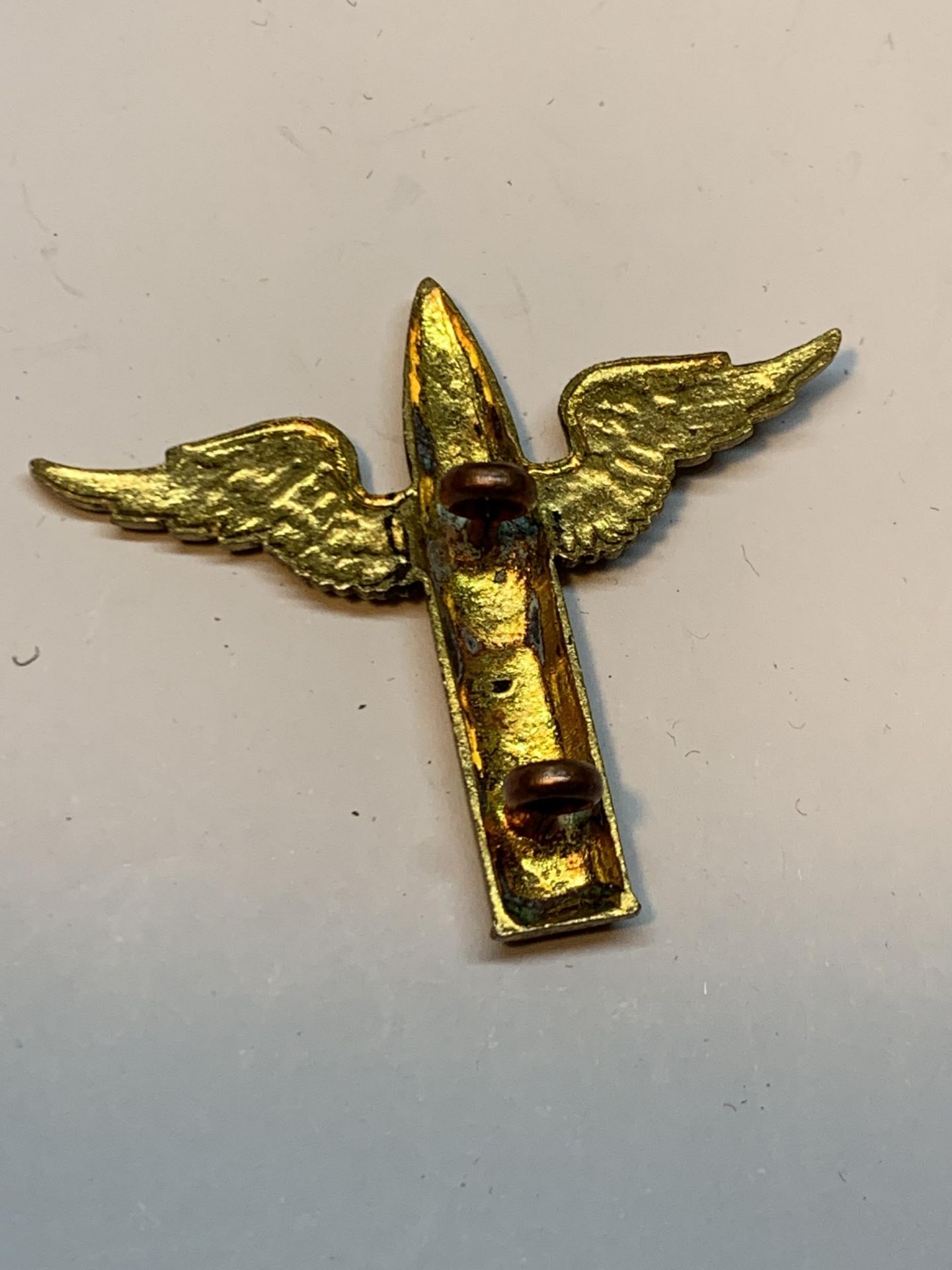 A BRASS ROYAL AIR FORCE AIR GUNNER BADGE WITH BULLET AND WING DESIGN - Image 2 of 2