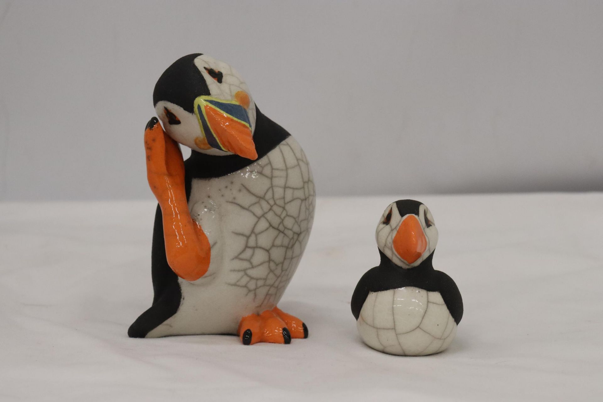 TWO PUFFIN FIGURES