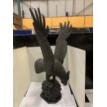 A VINTAGE HANDCARVED WOODEN EAGLE WITH REMOVEABLE WINGS HEIGHT 60CM