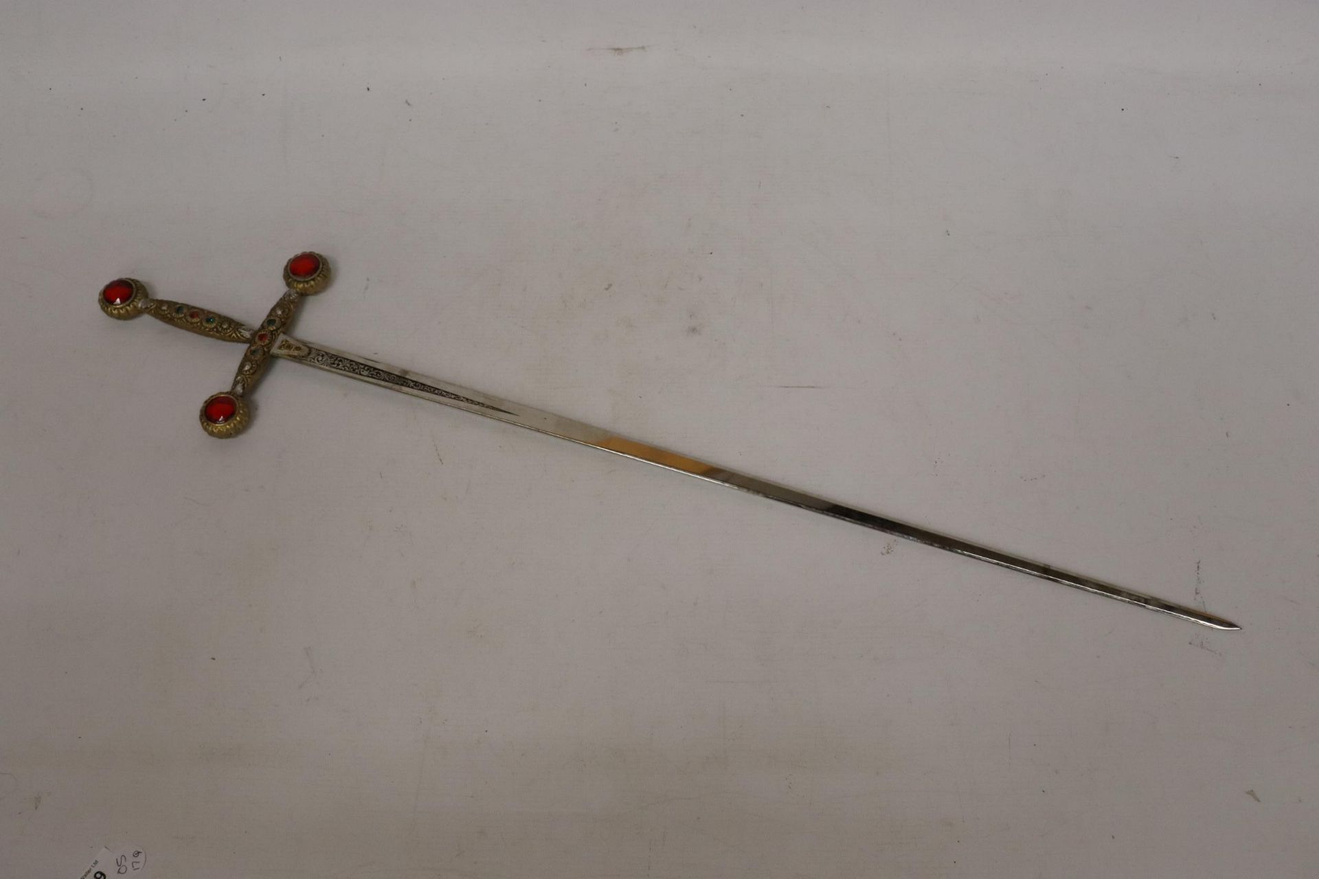 A SPANISH JEWELLED ORNAMENTAL SWORD MADE OF TOLEDO STEEL, LENGTH 31 INCHES