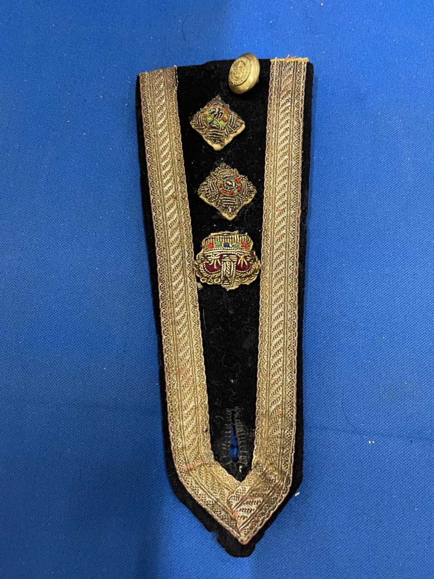 A GEORGIAN MILITARY LAPEL WITH BRAIDING