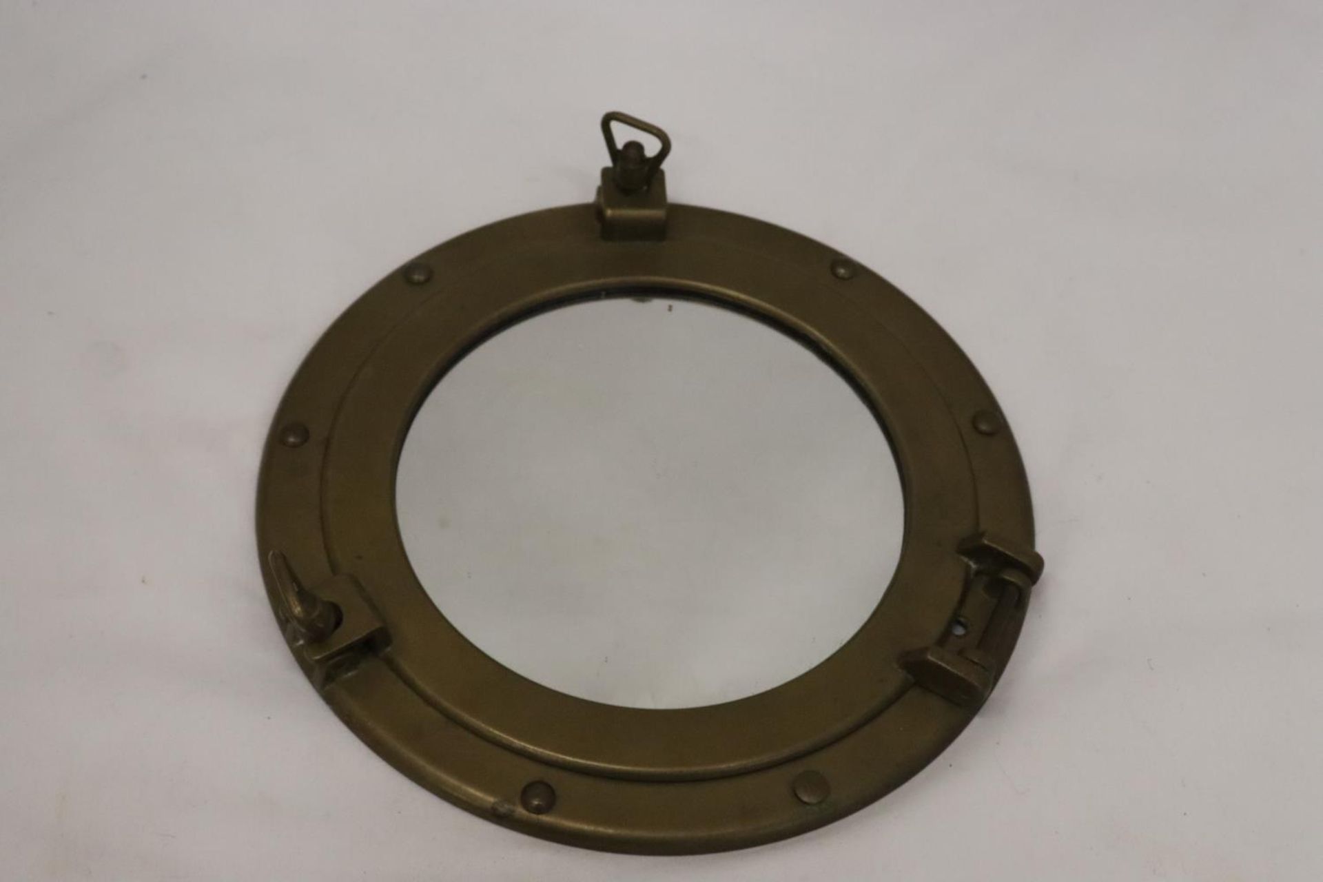 A BRASS PORTHOLE MIRROR WITH TWO WOODEN FRAMES - Bild 8 aus 9