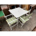A WHITE PAINTED PATIO TABLE AND FOUR DIRECTORS CHAIRS (LACKING BACK PANELS)