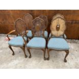 A SET OF SIX EDWARDIAN WALNUT DINING CHAIRS WITH CANE BACKS ON CABRIOLE FRONT LEGS WITH GOLD PAINTED