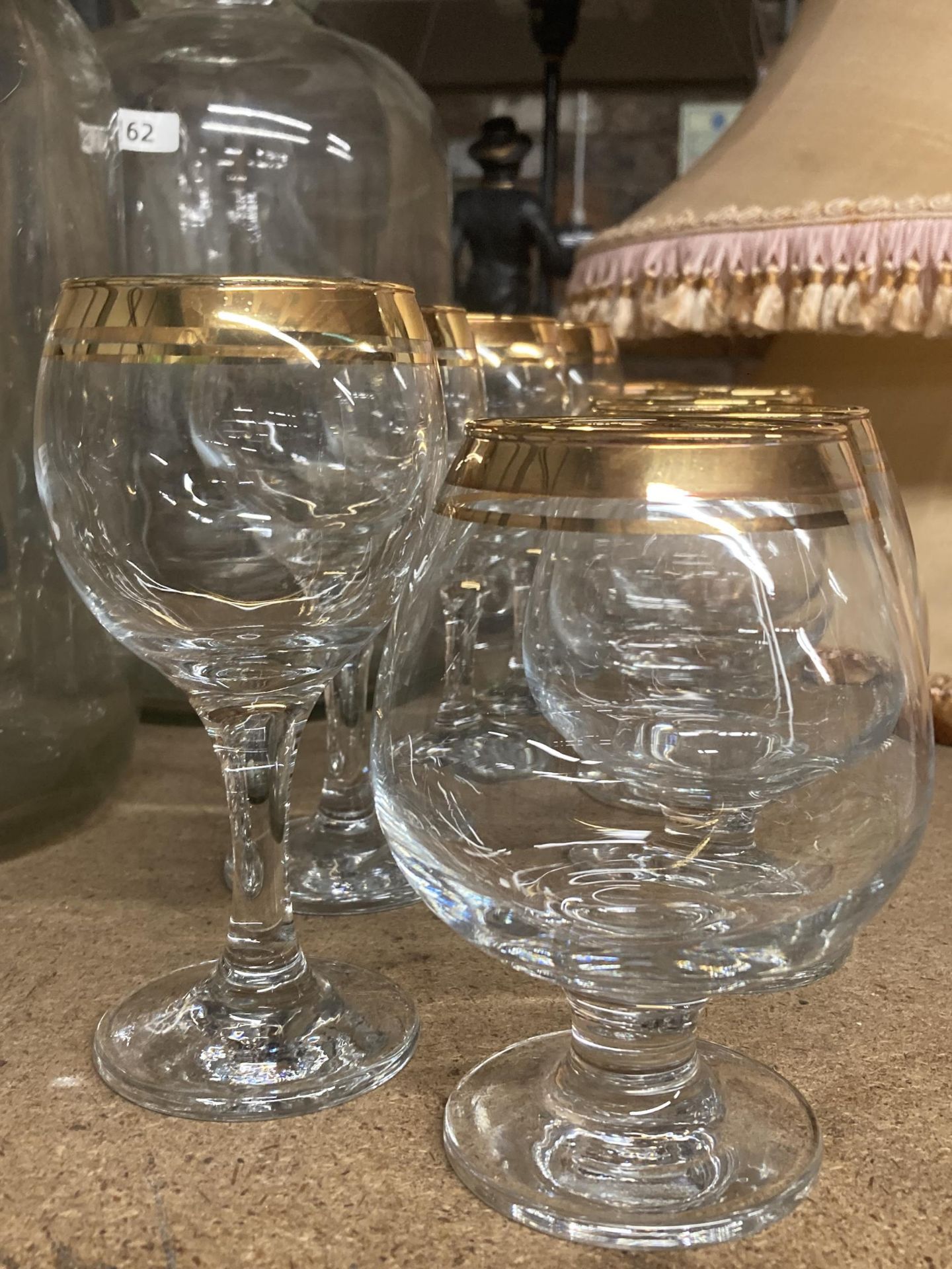 GILT RIMMED GLASSES TO INCLUDE WINE, BRANDY ETC