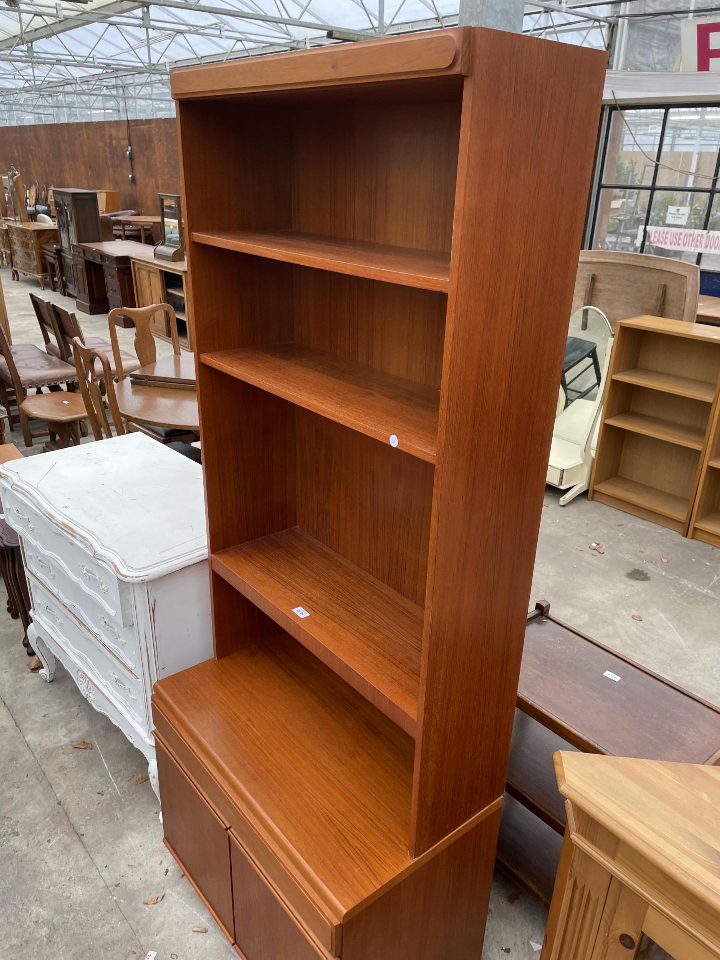 A RETRO TEAK OPEN BOOKCASE WITH CUPBOARDS TO BASE - 30 INCH WIDE - Image 2 of 3