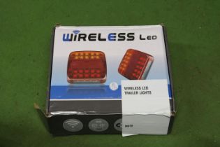 A PAIR OF WIRELESS LED TRAILER LIGHTS