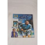 A MANCHESTER CITY V FULHAM PROGRAMME FROM 16 JANUARY 2000, SIGNED TO THE COVER BY SIX MANCHESTER