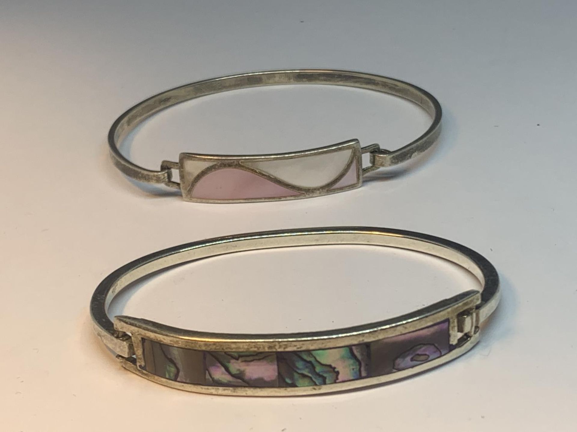 TWO SILVER BANGLES