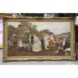 A LARGE GILT FRAMED OIL OF A VINTAGE WEDDING SCENE, 101CM X 62CM