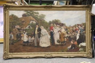 A LARGE GILT FRAMED OIL OF A VINTAGE WEDDING SCENE, 101CM X 62CM