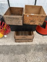 THREE VINTAGE WOODEN MONOGRAMED CRATES AND A FURTHER WOODEN BOX