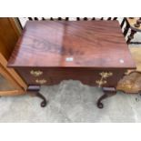 A 19TH CENTURY STYLE MAHOGANY LOW BOY ON FRONT CABRIOLE LEGS 28" WIDE