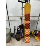 AN ASSORTMENT OF SPORTS ITEMS TO INCLUDE HOCKEY STICKS, RACKETS AND GOLF CLUBS ETC