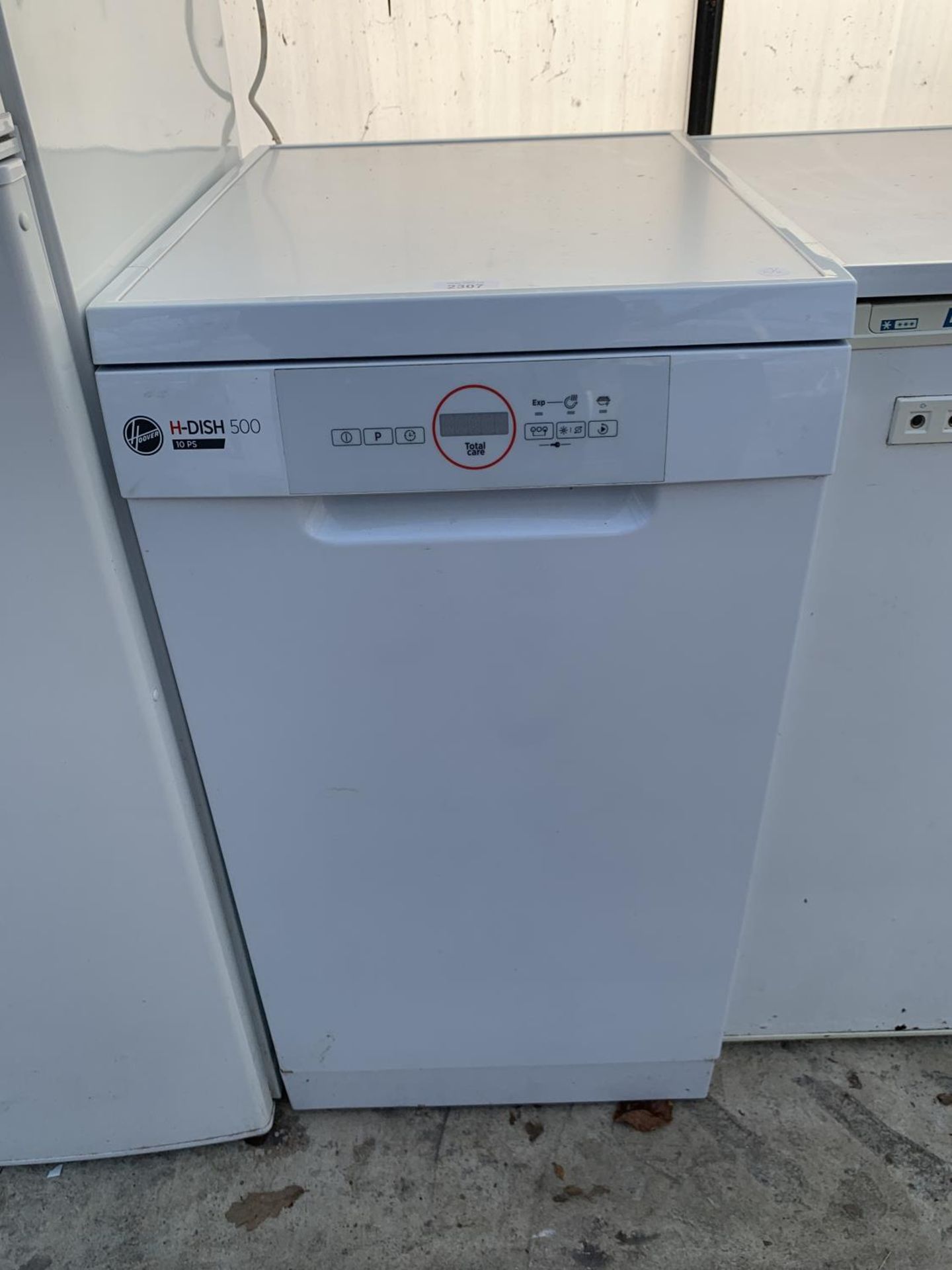 A WHITE HOOVER SLIM LINE DISH WASHER