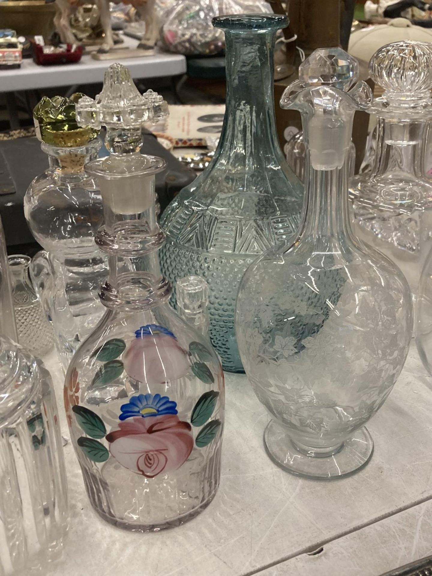 A QUANTITY OF GLASS BOTTLES SOME WITH STOPPERS AND DECANTERS - Image 2 of 4