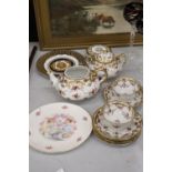 A TEAPOT, LIDDED SUGAR BOWL, CUPS AND SAUCERS, ALL HANDPAINTED WITH FLORAL AND GILT PATTERN - TEAPOT