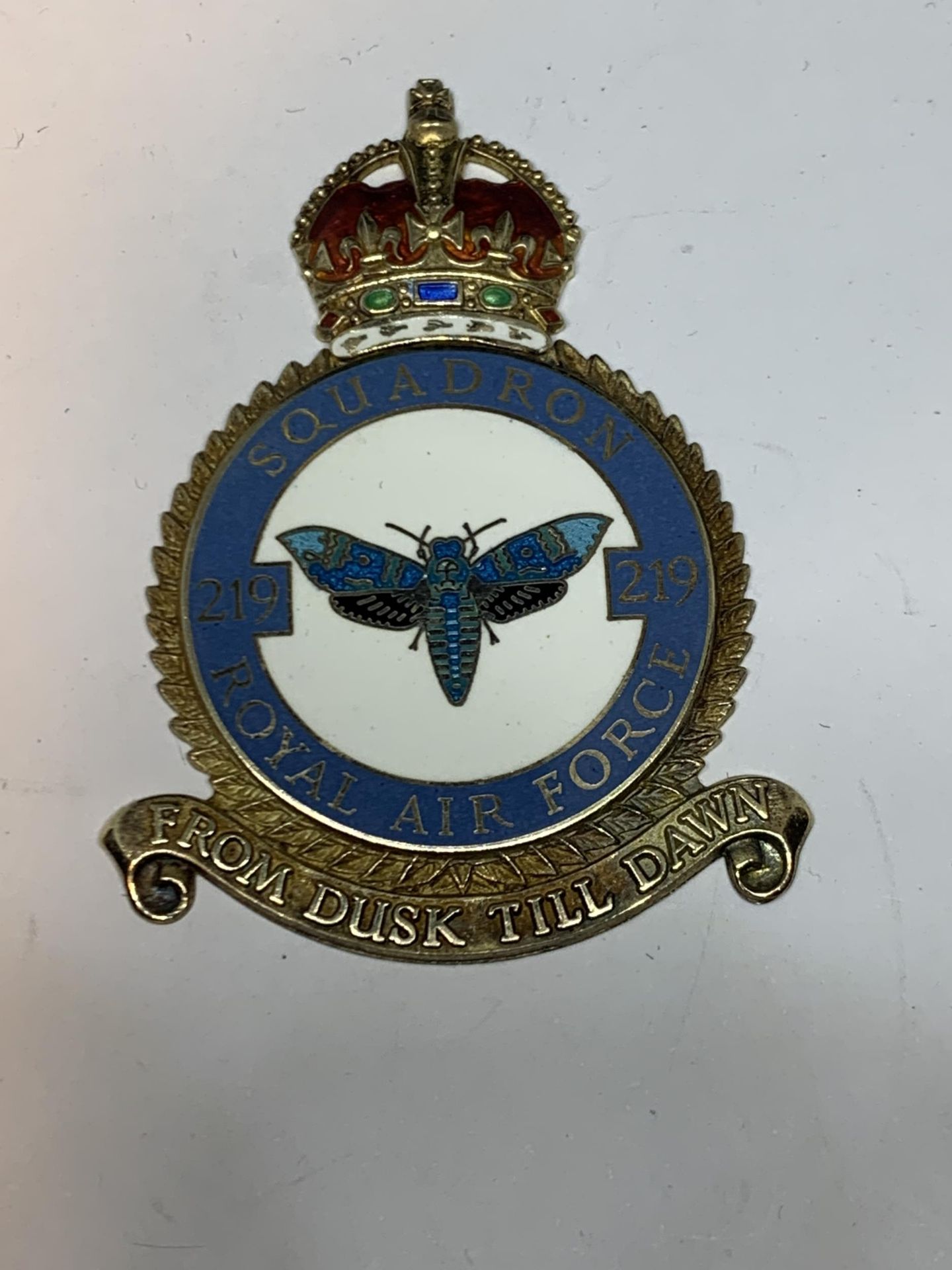 A HALLMARKED BIRMINGHAM SILVER ROYAL AIRFORCE SQUADRON 219 FROM DUSK TILL DAWN BADGE