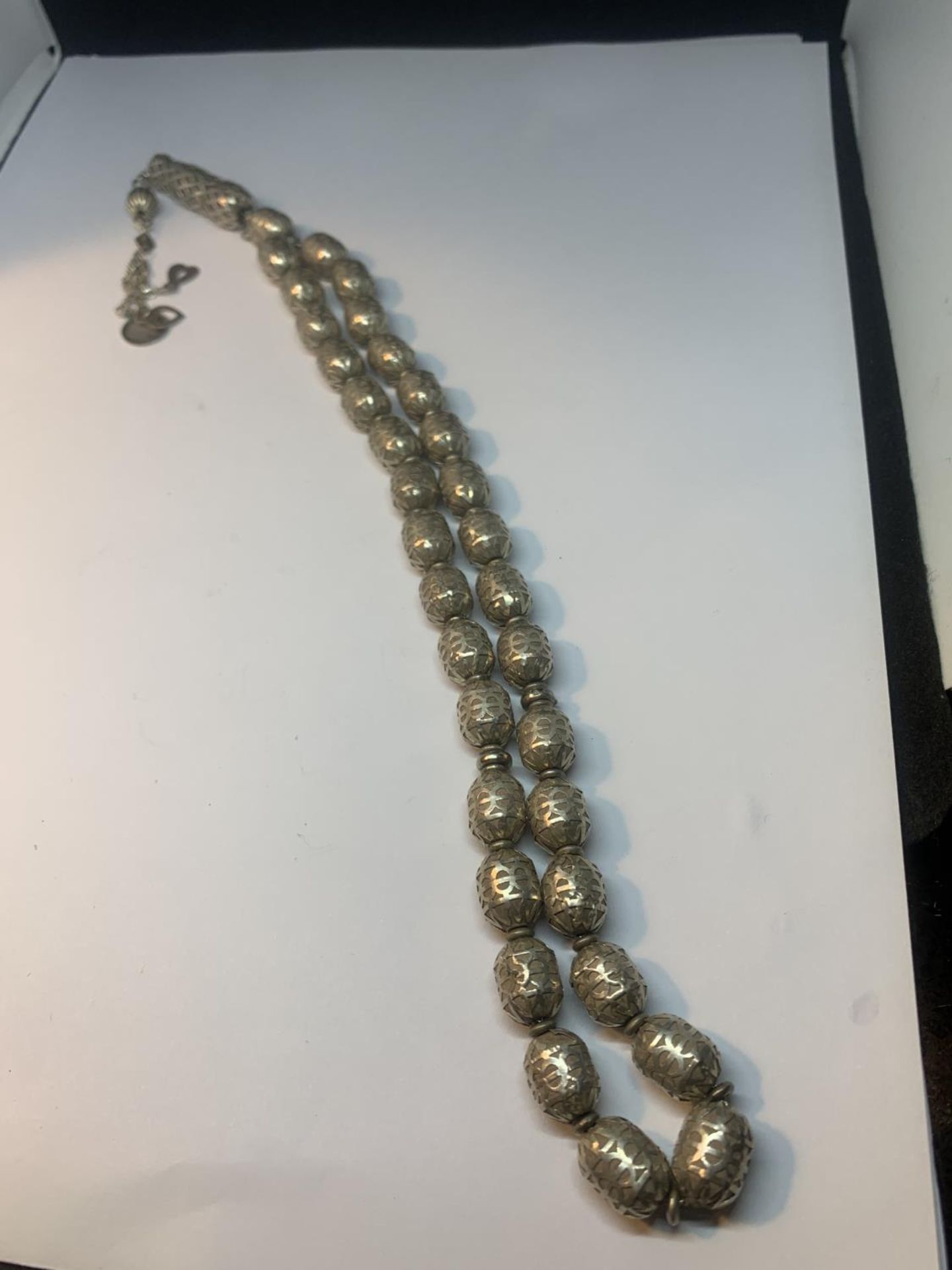 A SILVER NECKLACE