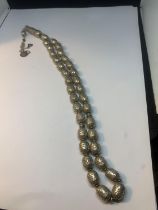 A SILVER NECKLACE