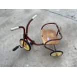A VINTAGE METAL CHILDS TRICYCLE