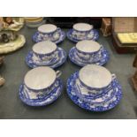 FIVE BLUE AND WHITE ORIENTAL EGGSHELL TEACUPS, SAUCERS AND FIVE SIDE PLATES