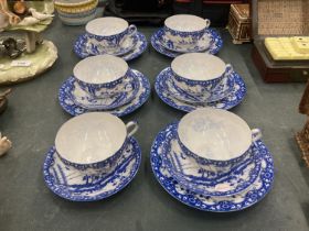 FIVE BLUE AND WHITE ORIENTAL EGGSHELL TEACUPS, SAUCERS AND FIVE SIDE PLATES