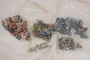 A LARGE QUANTITY OF PANDORA STYLE BEADS, SOME MARKED 925
