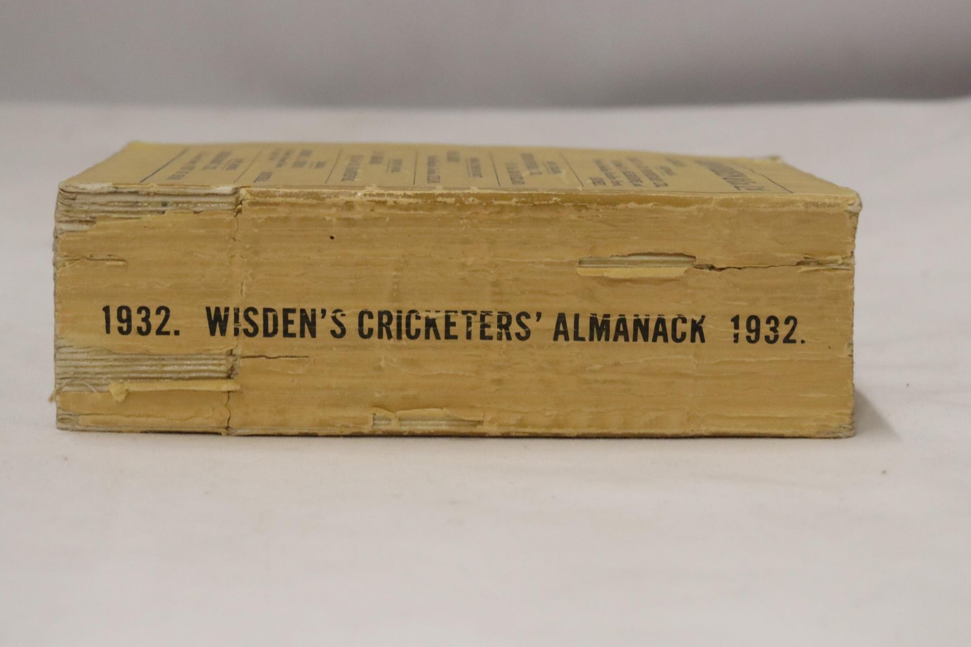 A 1932 COPY OF WISDEN'S CRICKETER'S ALMANACK. THIS COPY IS IN USED CONDITION, MISSING PART OF THE - Image 2 of 4