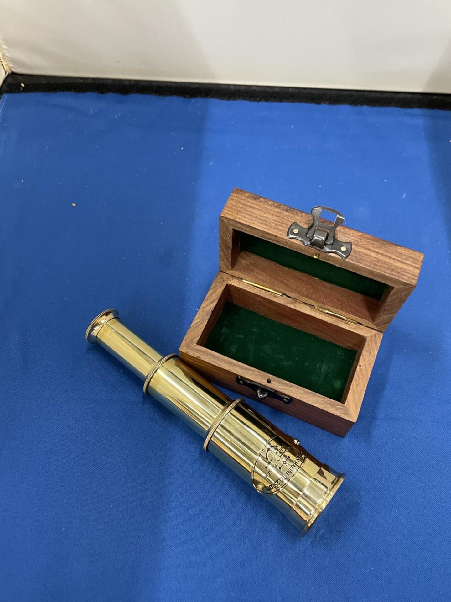 A BOXED BRASS VICTORIAN TELESCOPE