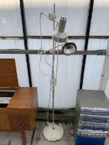 A TWO BRANCH FLOOR LAMP