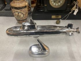 A CHROME SUBMARINE, NAUTILUS, ON PEDESTAL BASE, HEIGHT 20CM, LENGTH 34CM