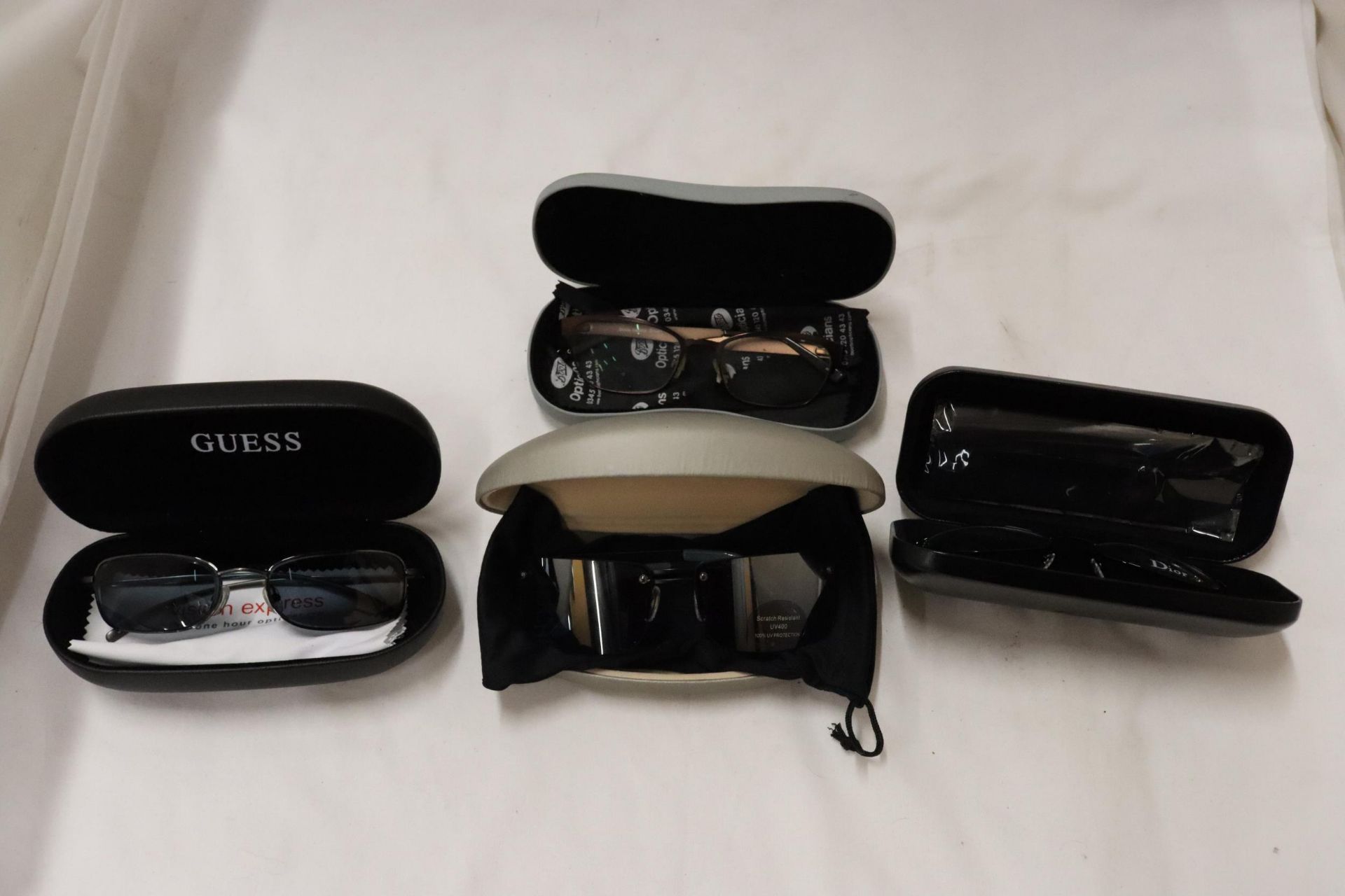 FOUR PAIRS OF SPECTACLES IN CASES TO INCLUDE TWO PAIRS OF SUNGLASSES