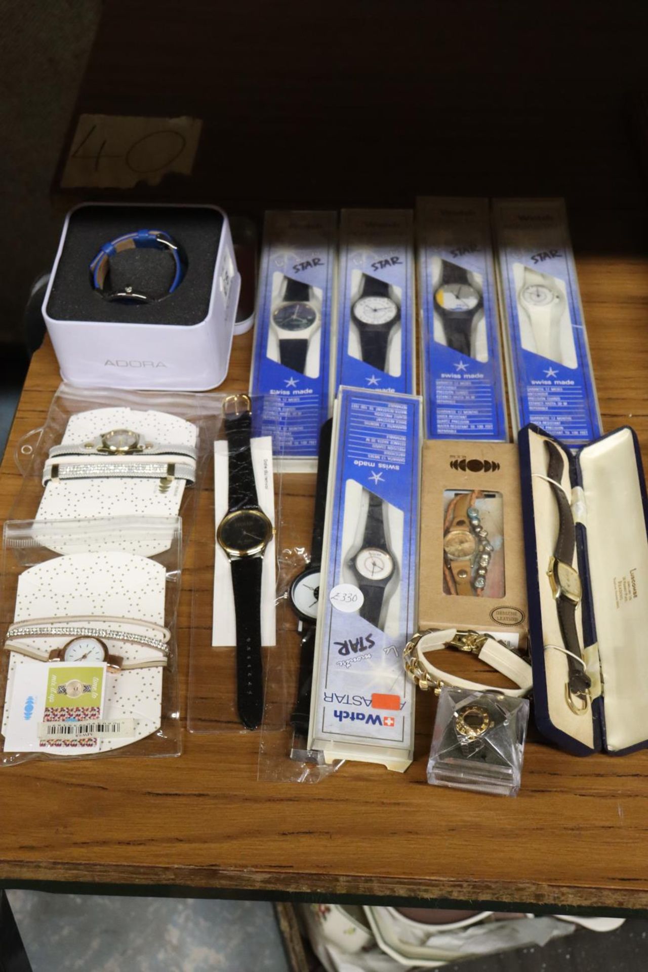 A QUANTITY OF WRISTWATCHES IN PACKAGING