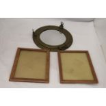 A BRASS PORTHOLE MIRROR WITH TWO WOODEN FRAMES