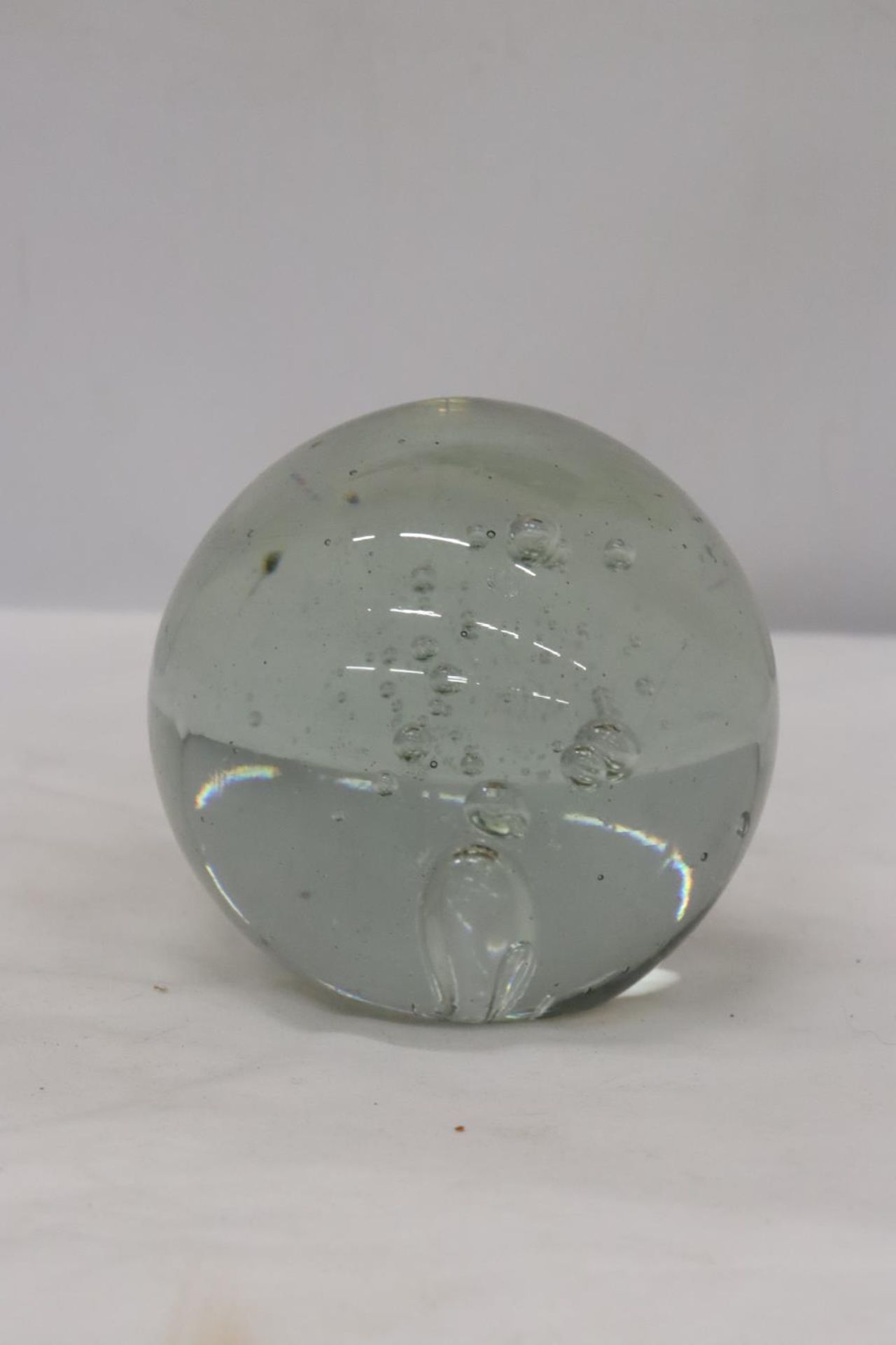 A LARGE VINTAGE GLASS DUMP PAPERWEIGHT