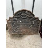 A VINTAGE AND DECORATIVE HEAVY CAST IRON FIRE BACK