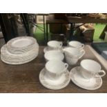 A QUANTITY OF TEAWARE WITH A GREEK PATTERN TO INCLUDE CUPS, SUACERS, PLATES, JUG AND SUGAR BOWL