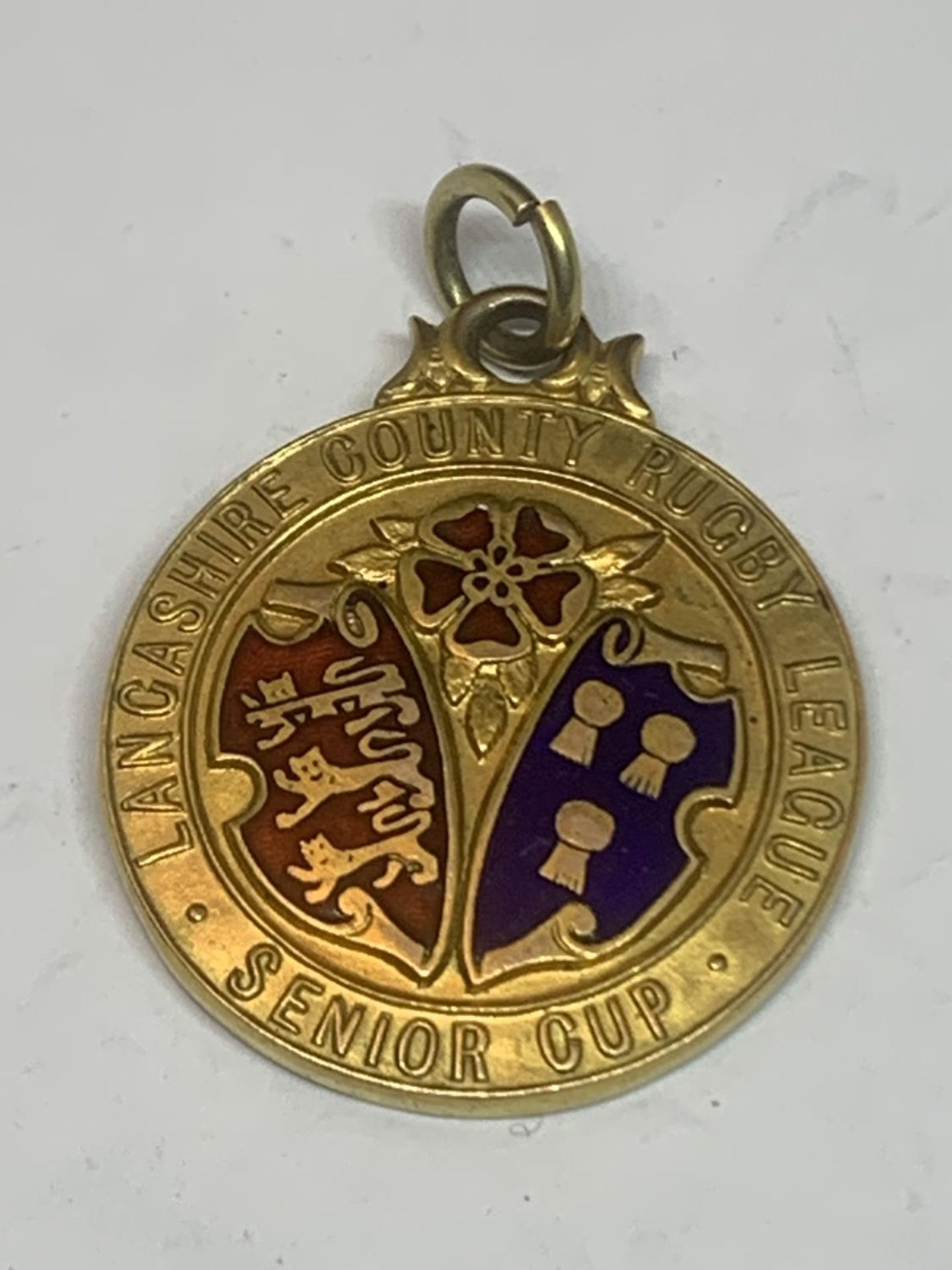 A HALLMARKED 9 CARAT GOLD LANCASHIRE COUNTY RUGBY LEAGUE SENIOR CUP MEDAL GROSS WEIGHT 17.38 GRAMS
