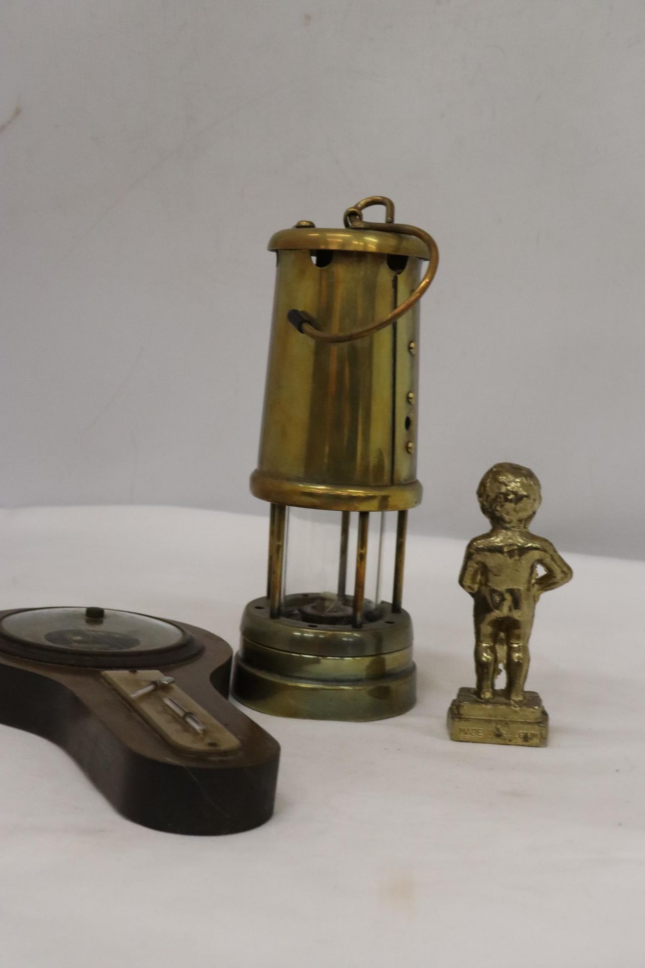 A BRASS MINER'S LAMP TOGETHER WITH A BAROMETER AND BRASS FIGURE - Image 5 of 7