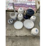 AN ASSORTMENT OF CERAMICS TO INCLUDE CADDIES, A PESTLE AND MORTAR AND AN OLIVE OIL JUG ETC