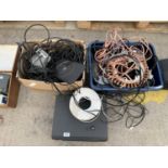 AN ASSORTMENT OF CABLES, EXTENSION LEADS AND A VHS PLAYER ETC