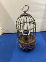 A MECHANICAL BRASS BIRD CAGE CLOCK