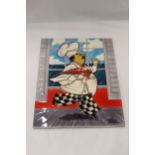 A LARGE TILE WITH A CHEF DESIGN, 28CM X 36CM